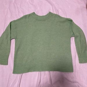 light green sweater